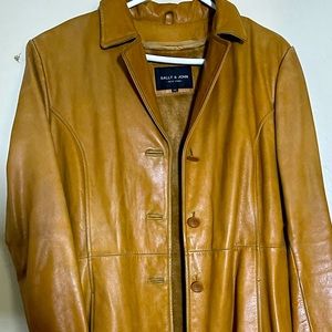 3 quarter length Leather Button Down Coat… With inside layer that zips off..